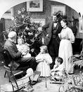 alegria da família reunida em volta da árvore de Natal